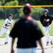 Milan junior Kyle Schrader runs to third in the game against Richmond on Friday, June 14. Daniel Brenner I AnnArbor.com